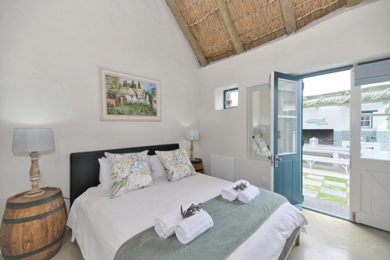 Zuidste Huisie Fisherman'S Cottage สตรุยส์บาย ภายนอก รูปภาพ